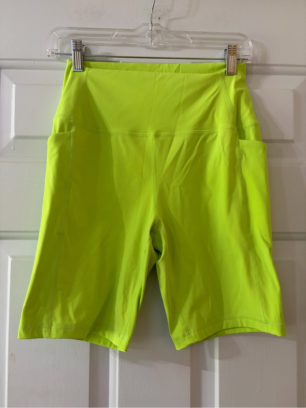 Neon Lime Green Women’s Biker Shorts with pockets 8” inseam. Size medium